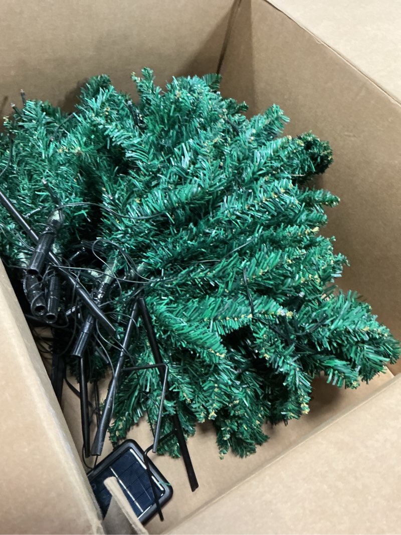 Condition photo showing As Is for Upgraded 6-Pack 120 LED Solar Christmas Garden Stake Lights, Outdoor Waterproof Solar Xmas Tree Yard Stake Christmas Pathway Lights for Christmas Decorations Garden Yard Lawn Pathway (8 Modes)