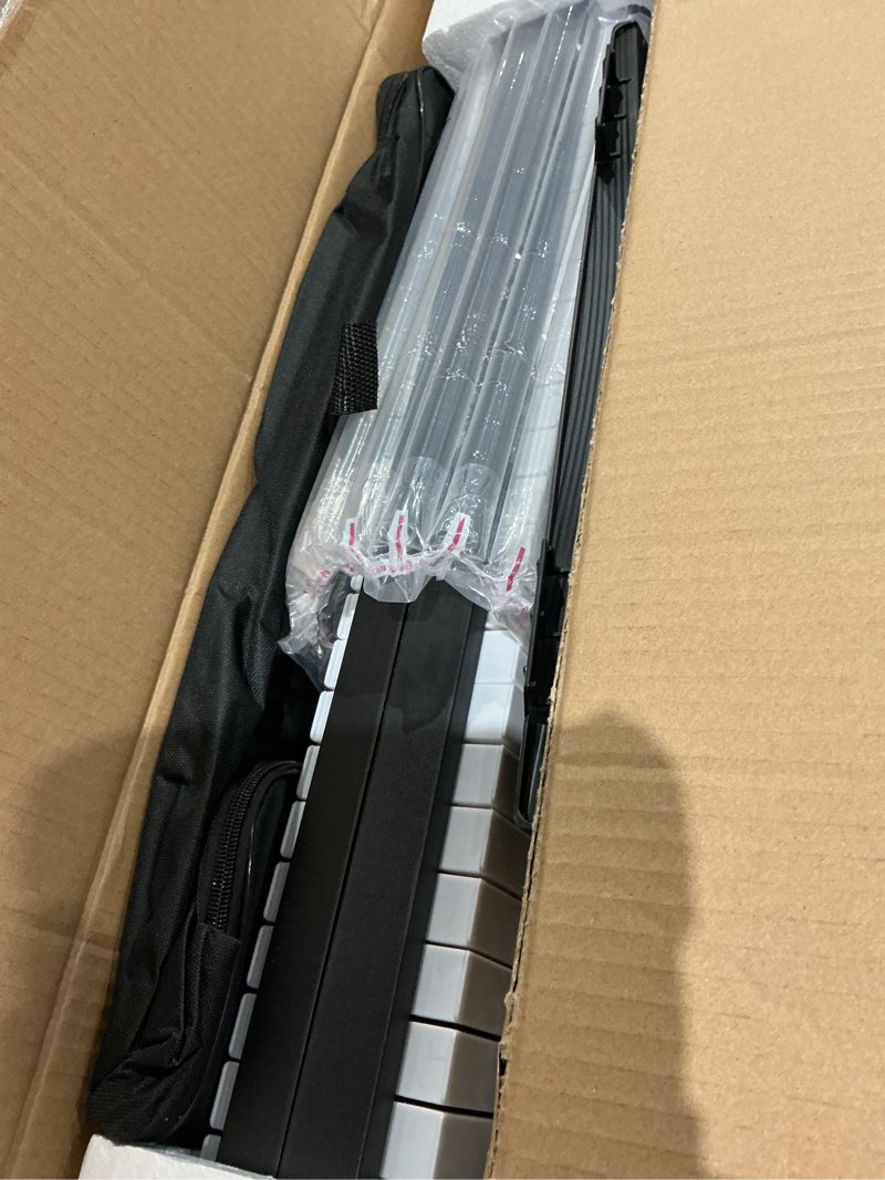 Condition photo showing Good Condition for strich 88 key digital piano foldable full size electric keyboard with semi-weighted sensitive keys, portable electric piano set for beginner, bundle with sustain pedal, headphones, music rest, sep-88f