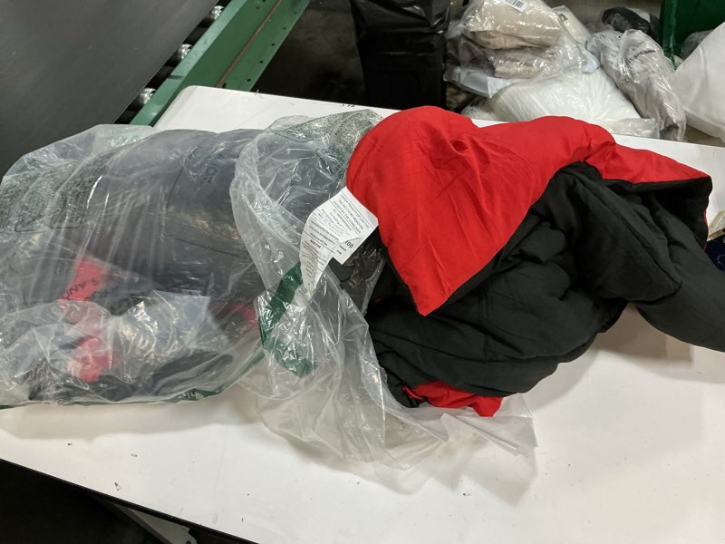 Condition photo showing As Is for black red reversible bedding, size 86” x 82”