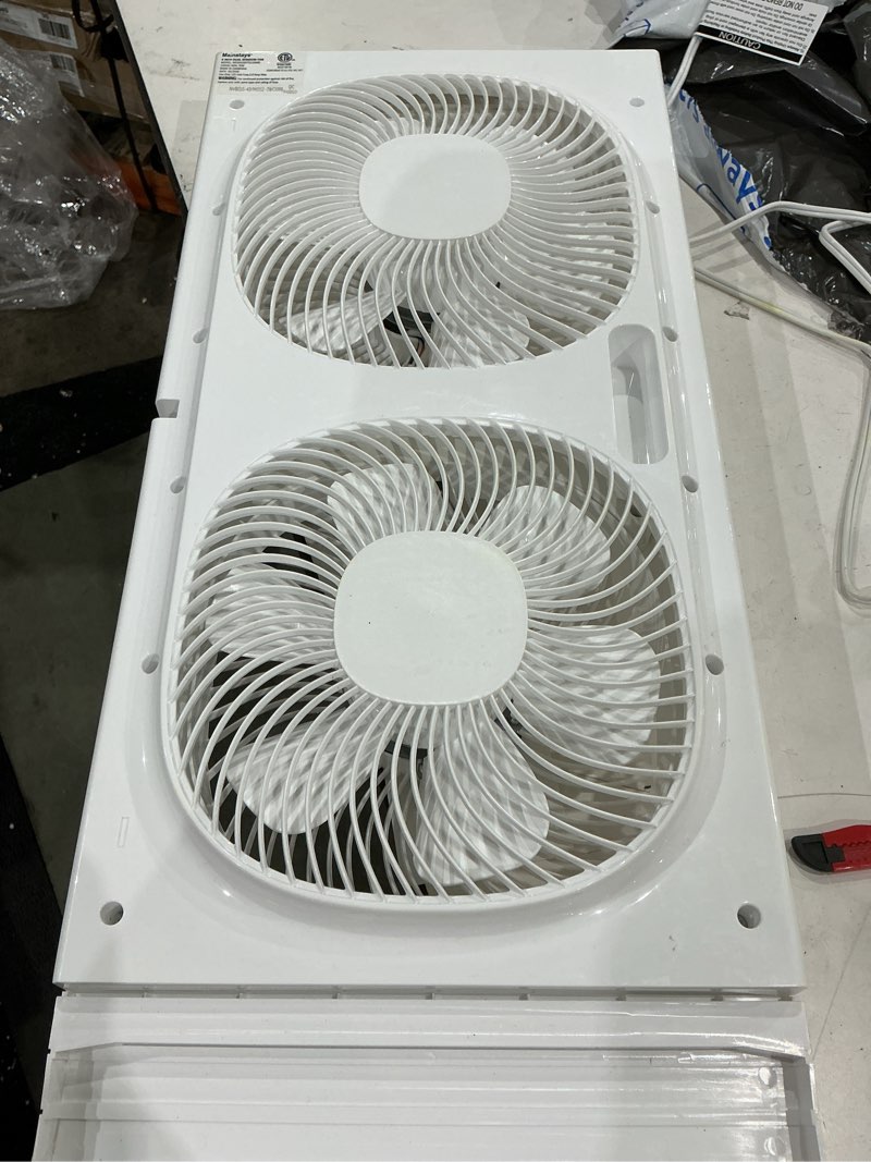 Condition photo showing As Is for mainstays 9'' 3-speed, reversable twin window fan, white