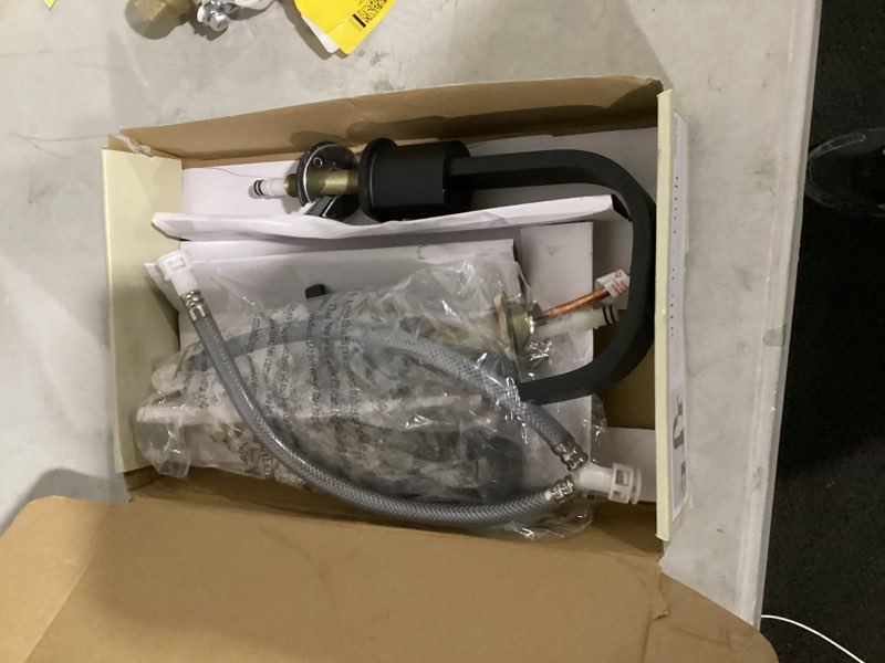 Condition photo showing As Is for origin 21 veda matte black 2-handle widespread watersense bathroom sink faucet with drain