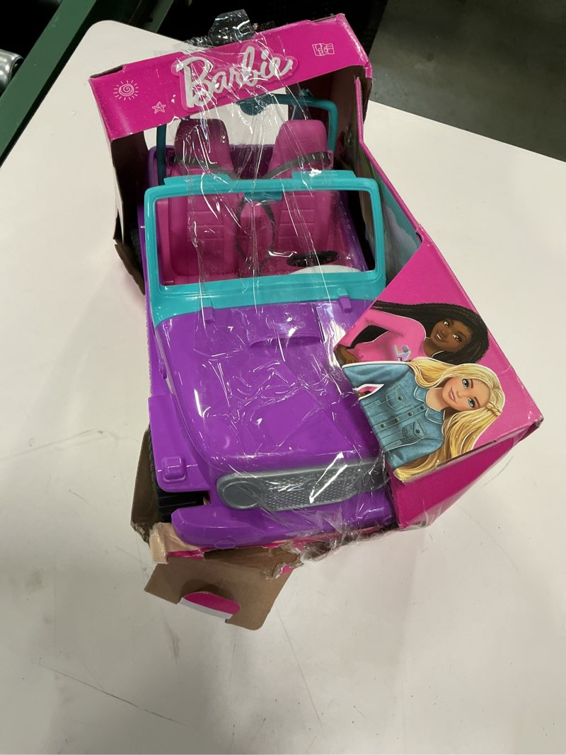 Condition photo showing Good Condition for Barbie Off-Road Vehicle Purple with Pink Seats and Rolling Wheels
