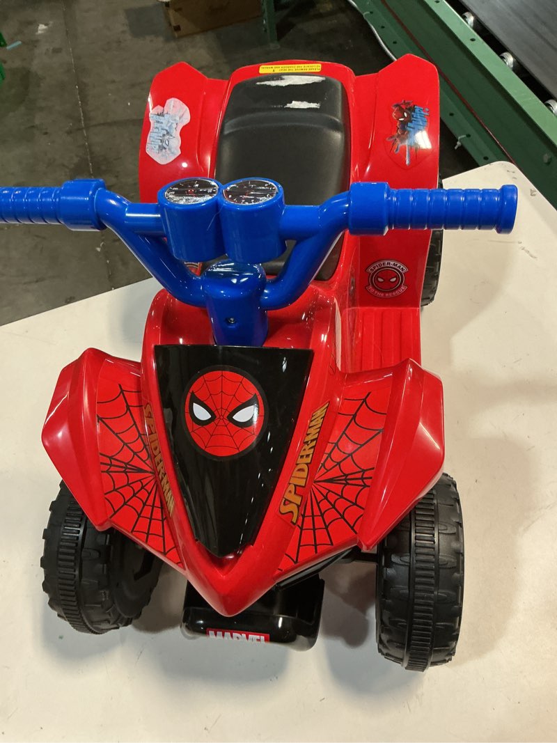 Condition photo showing As Is for ( incomplete ) spiderman atv, 6v battery powered ride on, ages 18m to 36m