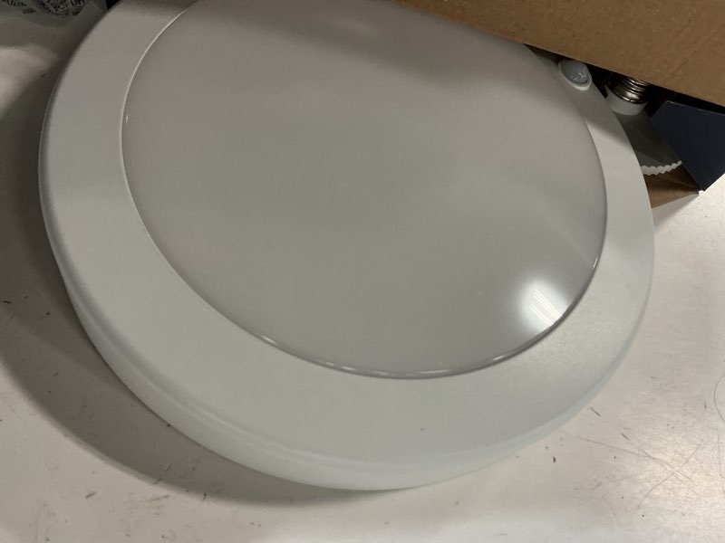 Condition photo showing As Is for  juno contractor select jsbt 8.39-in white indoor 1 -light led motion sensor flush mount light with