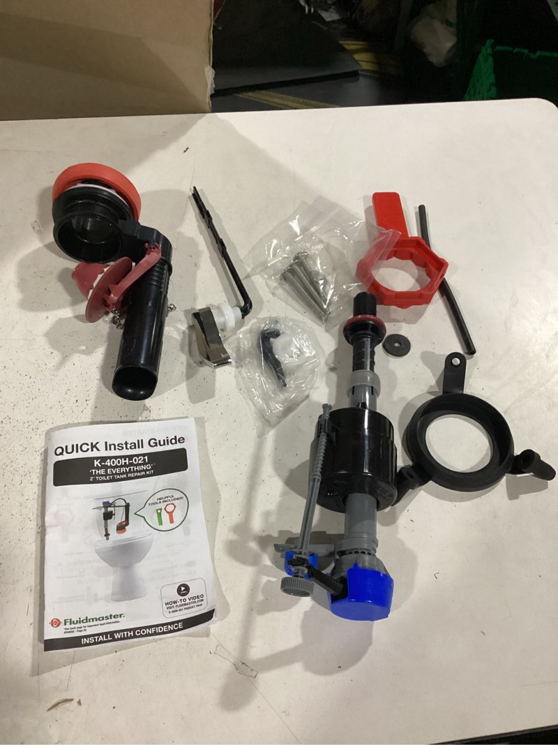 Condition photo showing As Is for fluidmaster universal kit incomplete