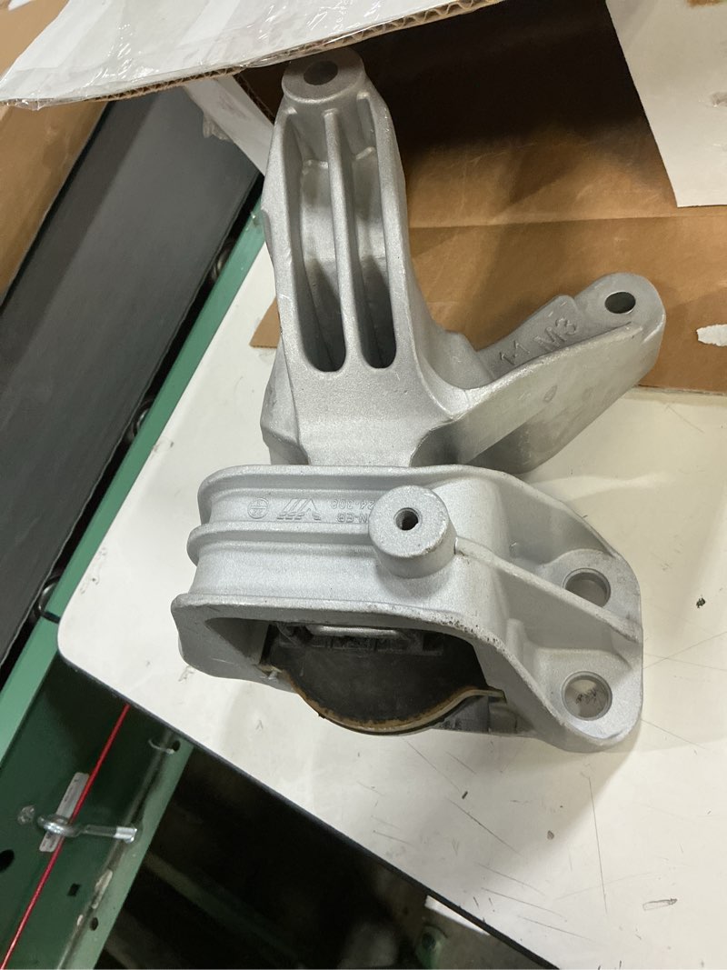 Condition photo showing As Is for transmission mount for auto. 