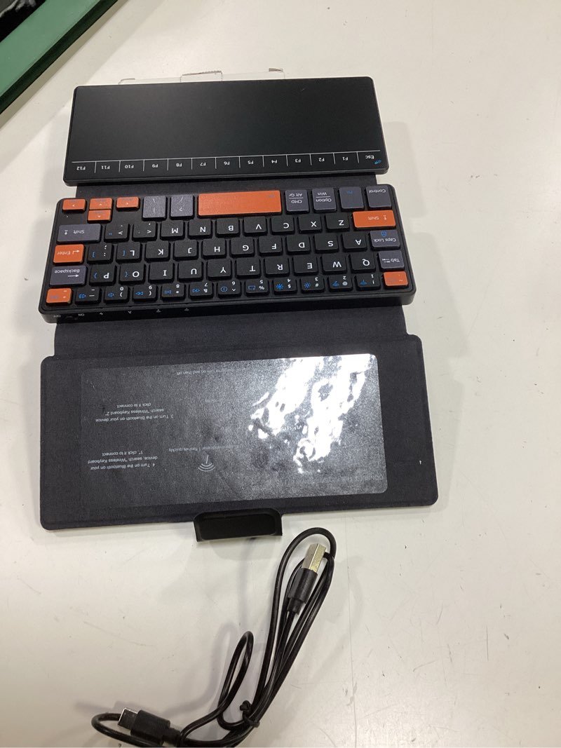Condition photo showing Good Condition for doohoeek travel keyboard with touchpad, universal compact keyboard with large trackpad & any-angle stand for android/ios/windows, dual-device bluetooth keypad for phones/galaxy z fold/ipad mini