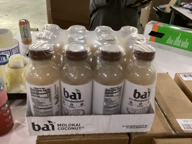 Condition photo showing New/Like New for best by 6/24/26****bai antioxidant infused water beverage, molokai coconut, with vitamin c and no artificial sweeteners, 18 fluid ounce bottle, 12 pack molokai coconut 12 pack