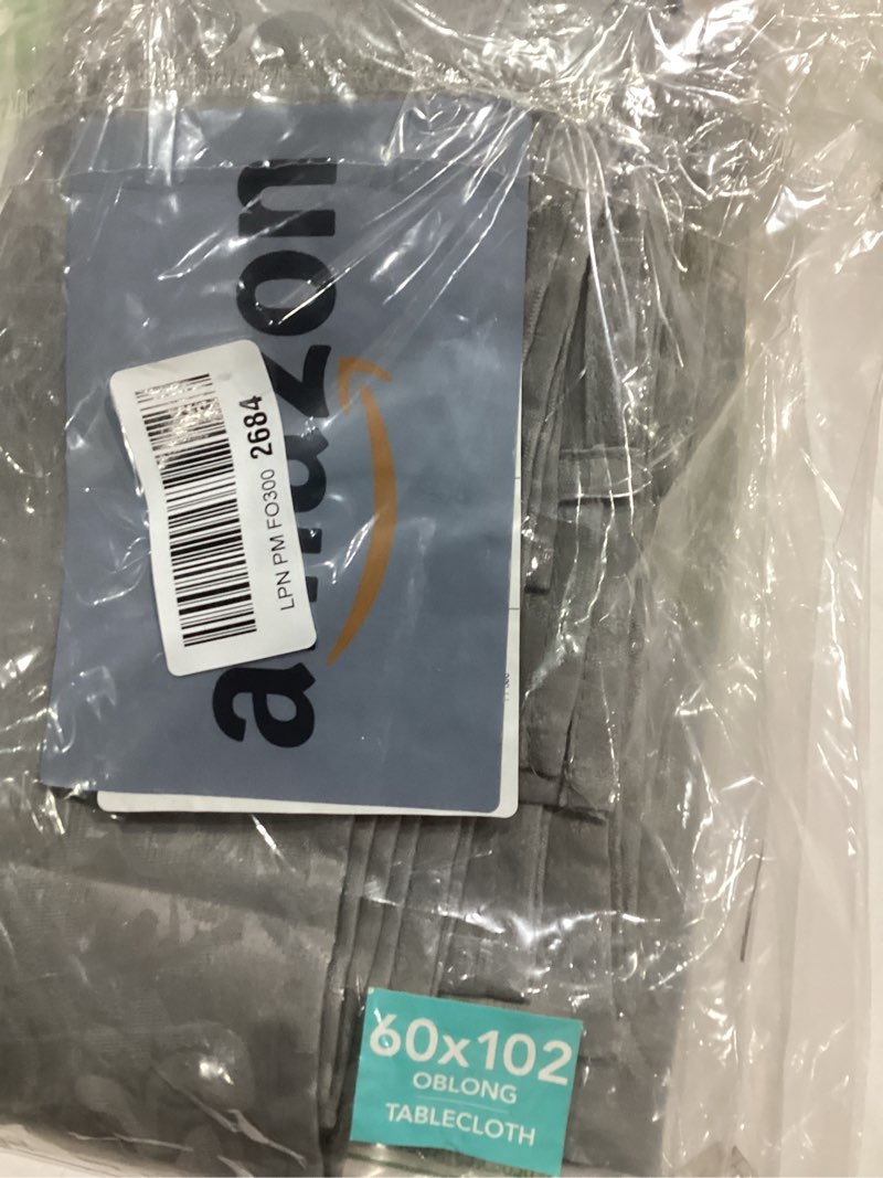 Condition photo showing Good Condition for Elrene Home Fashions Caiden Elegance Damask Waterproof, Stain & Wrinkle Resistant Fabric Tablecloth, 60" x 102" Oblong/Rectangle, Silver Tablecloth (1) Silver 102" x 60" (Rectangular)