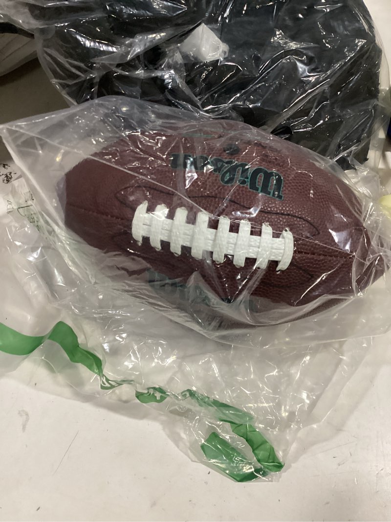 Condition photo showing New/Like New for WILSON NFL Ignition Gen Green Football - Brown, Peewee Size
