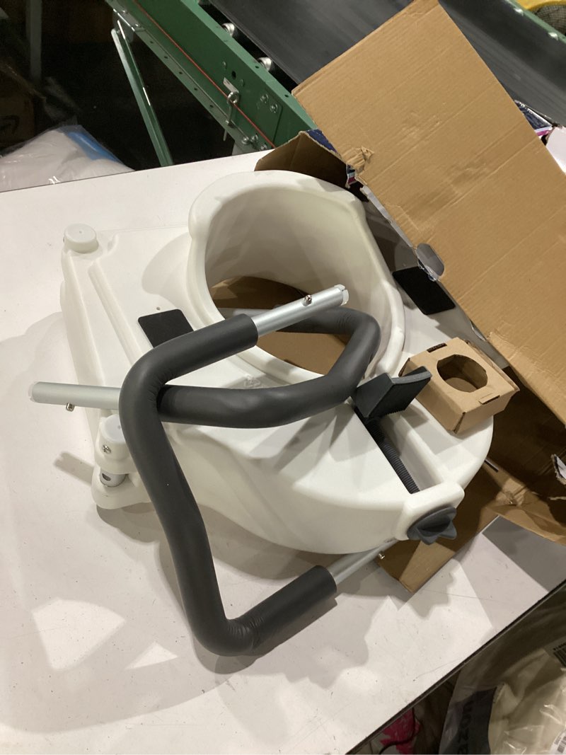 Condition photo showing As Is for drive medical 2-in-1 raised toilet seat with removable padded arms - elevated bathroom safety support - secure locking attachment - easy height assistance - durable construction, standard toilets