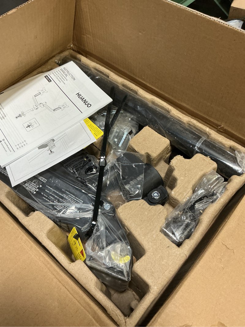 Condition photo showing Good Condition for huanuo dual monitor mount up to 32 inches screens, taller monitor stand hold 19.8lbs, dual monitor arm desk mount easy adjustable with tilt, swivel, rotation, vesa 75/100mm