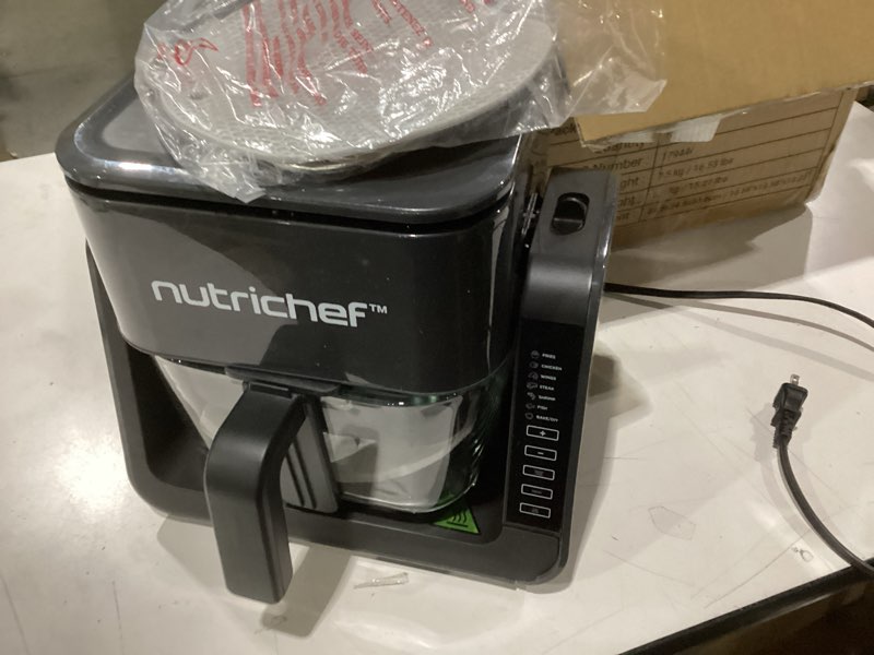 Condition photo showing As Is for Used small chips on bottom NutriChef 4 QT Air Fryer & Grill | 7-1 Preset Cook Modes | Transparent Fry Bowl for Best Cooking Results | Cook Shrimp, Steak, Fries, Wings & More | 4 QT Glass Air Fryer & 1.2 QT Grill | Black