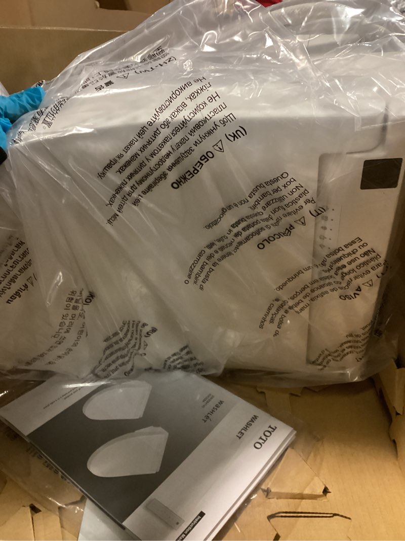 Condition photo showing New/Like New for TOTO® WASHLET® C5 Electronic Bidet Toilet Seat with PREMIST and EWATER+ Wand Cleaning, Elongated, Cotton White - SW3084#01 Cotton White C5 Elongated