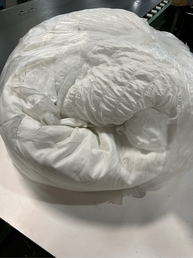 Condition photo showing As Is for JOLLYVOGUE White King Comforter Set, 3 Pieces Seersucker Comforters King Size, Lightweight & Fluffy Bedding Sets King for All Season with 1 Ruffle Comforter and 2 Ruffle Pillowshams King White