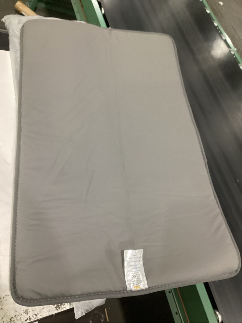 Condition photo showing As Is for floor mat 