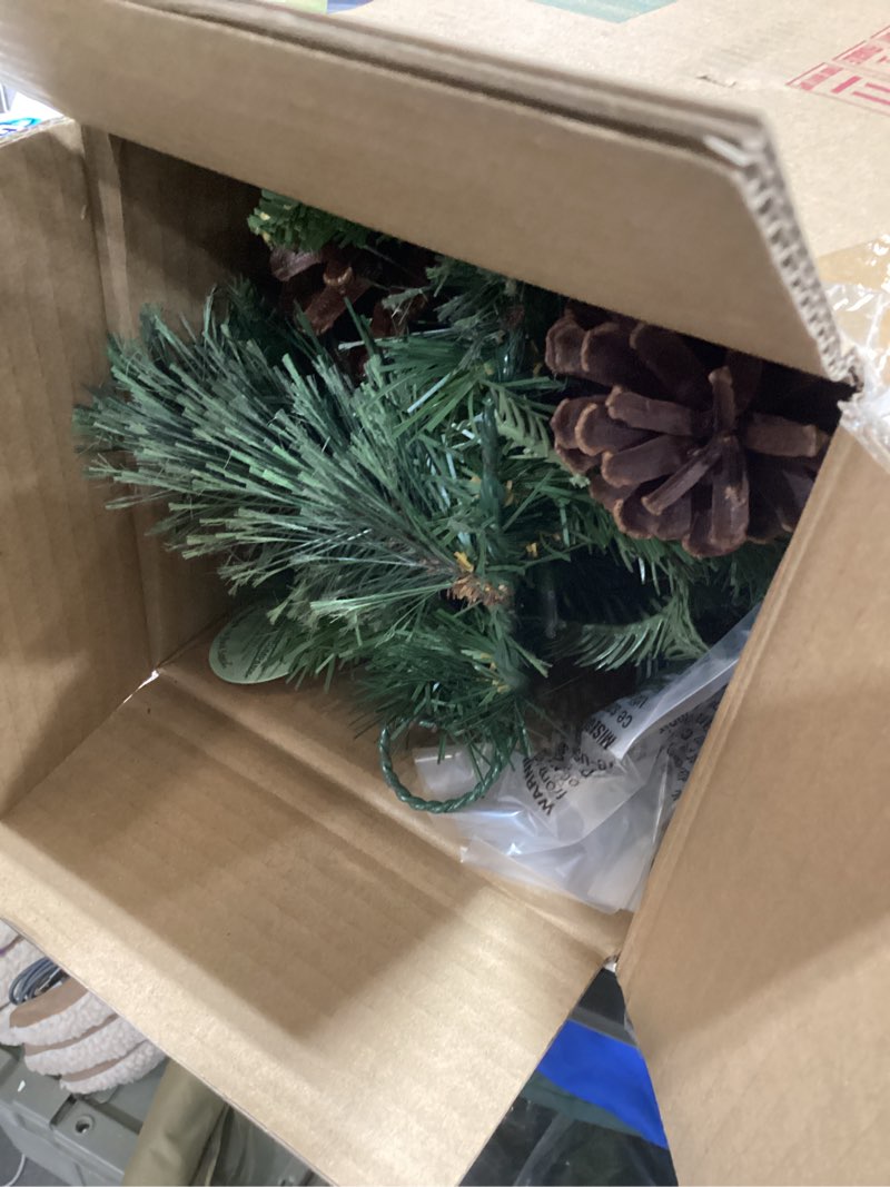 Condition photo showing Good Condition for National Tree Company 9 ft Pre-Lit Colonial Fir, Artificial Christmas Garland, Christmas Decoration with Red Berries, Pinecones, 50 Dual Color LED Lights, 220 Tips, 10 Light Functions, Timer, Green