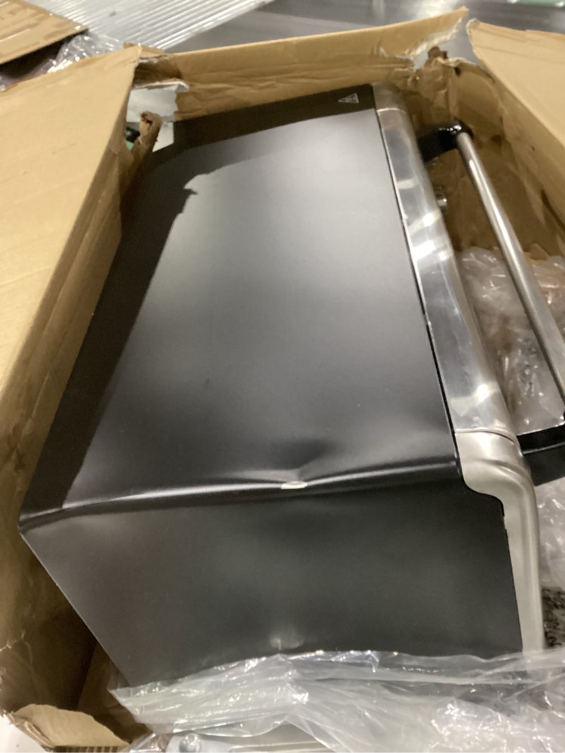 Condition photo showing As Is for black+decker to3250xsbd 8-slice extra wide convection countertop toaster oven, includes bake pan, broil rack & toasting rack, stainless steel/black