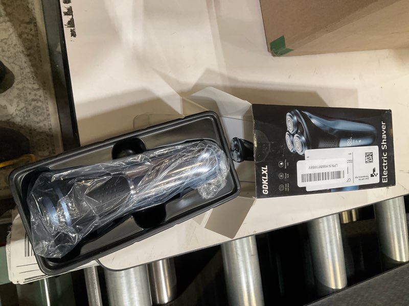 Condition photo showing As Is for Electric shaver