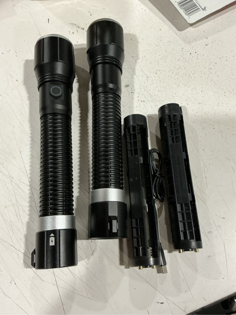 Condition photo showing As Is for 8,000 lumen dual power flashlight