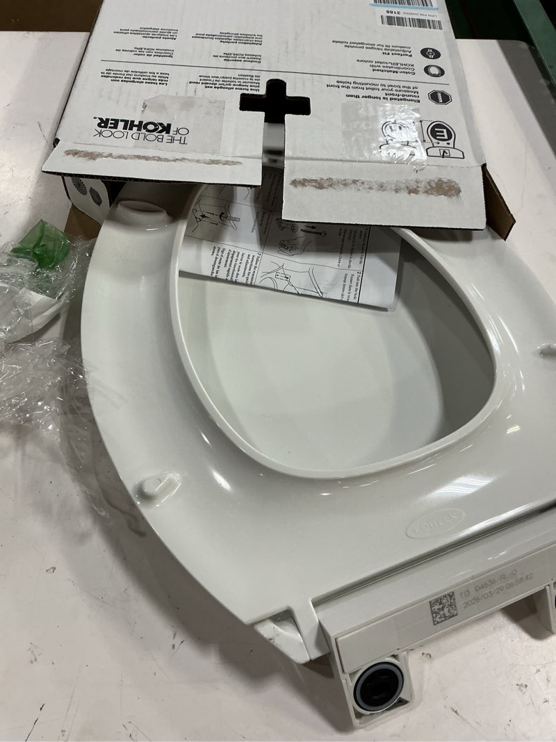 Condition photo showing As Is for kohler 4636-rl-0 cachet readylatch elongated slow close toilet seat, soft close toilet seat quiet lid, contoured grip-tight bumpers installation hardware, apartment essentials, white white elongated ready latch