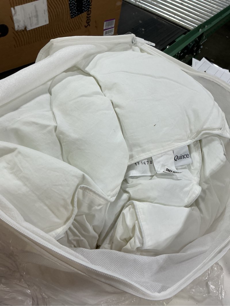 Condition photo showing As Is for all-season premium down alternative comforter, king/cal king, white