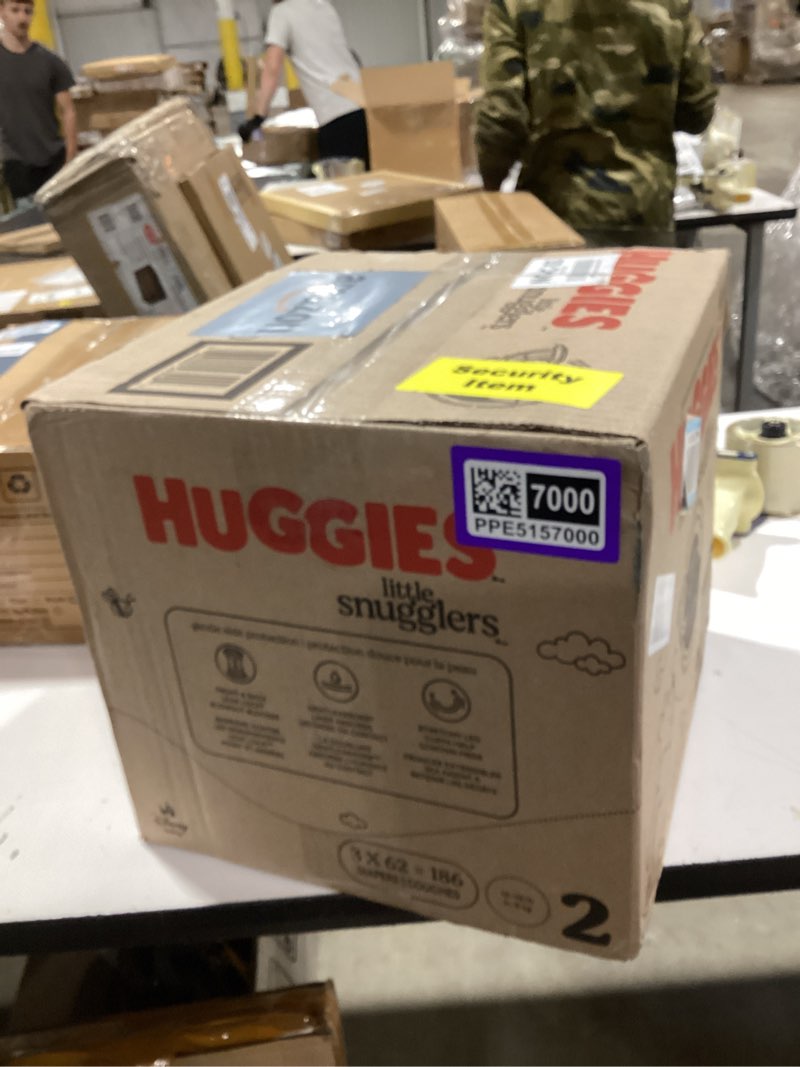 Condition photo showing New/Like New for huggies size 2 diapers, little snugglers baby diapers, size 2 (12-18 lbs), 186 count (3 packs of 62), packaging may vary size 2 186