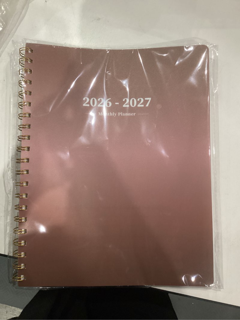 Condition photo showing New/Like New for Ymumuda 2026 Monthly Planner - 2 Year Monthly Planner, JAN.2026 to DEC.2027, 8.5" x 11", Large Calendar with Spiral Bound, 24 Coated Tabs,24 Months Perfect for School & Office Schedule, Rose Gold