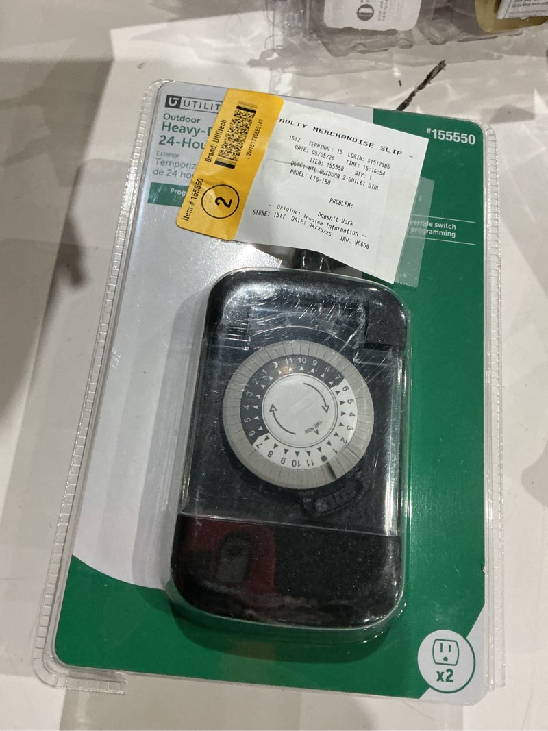 Condition photo showing As Is for utilitech 15-amps 125-volt indoor or outdoor 2-outlet countdown analog lighting timer