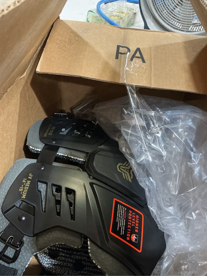 Condition photo showing As Is for m-150 junior varsity football shoulder pads, patents pending, lightweight, optimized mobility, enhanced impact protection, industry-best ventilation and cooling medium