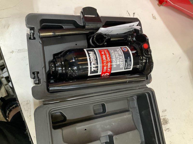 Condition photo showing As Is for torin black 6-ton steel hydraulic bottle jack