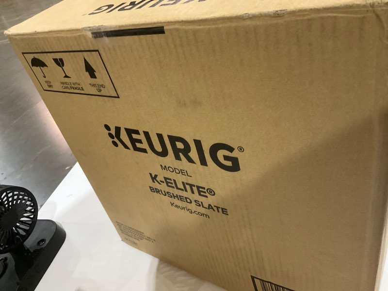 Condition photo showing As Is for keurig k-elite single serve k-cup pod coffee maker, with strength and temperature control, iced coffee capability, 8 to 12oz brew size, programmable, brushed slate