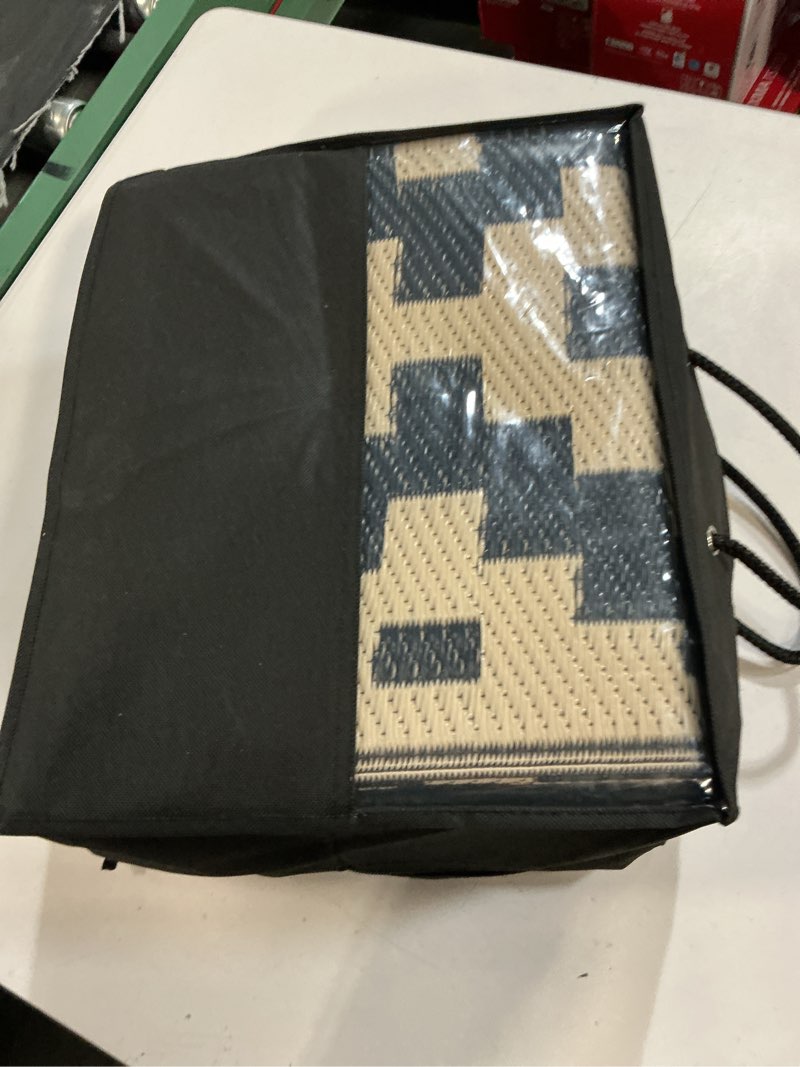 Condition photo showing Good Condition for smiry waterproof outdoor rug 6x9 ft, reversible plastic straw patio camping rugs, outdoor indoor rv mat carpet for patio, outside entry, backyard, deck, bench, picnic, camper, black & beige black and beige 6' x 9' (rectangular)