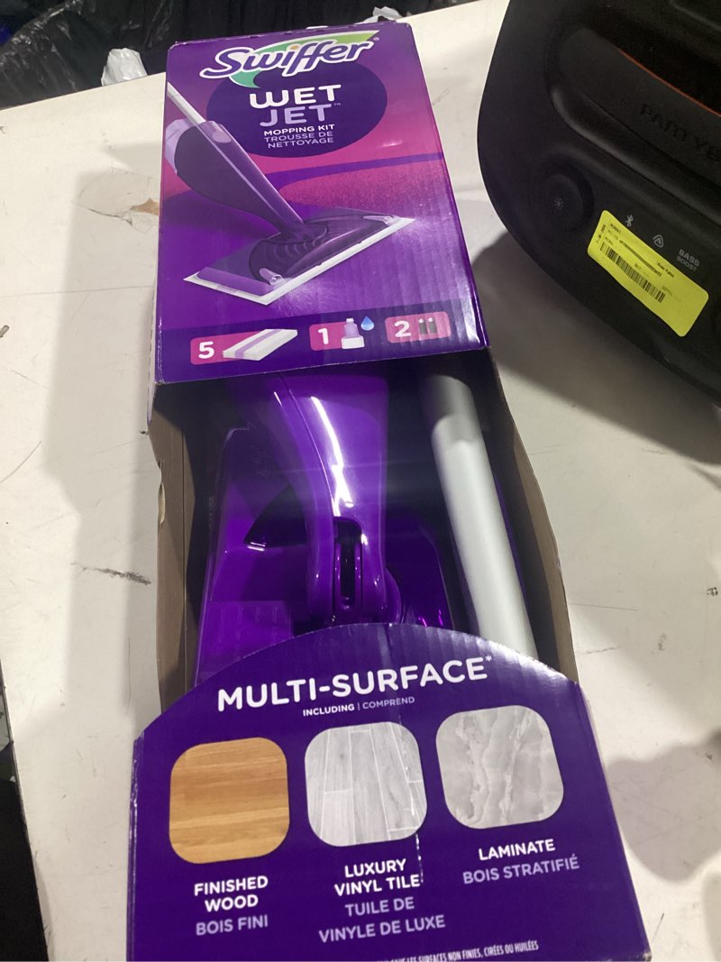 Condition photo showing Good Condition for swiffer wet jet with refill, unscented, 1 handle + 1 solution & 5 pads (battery included)