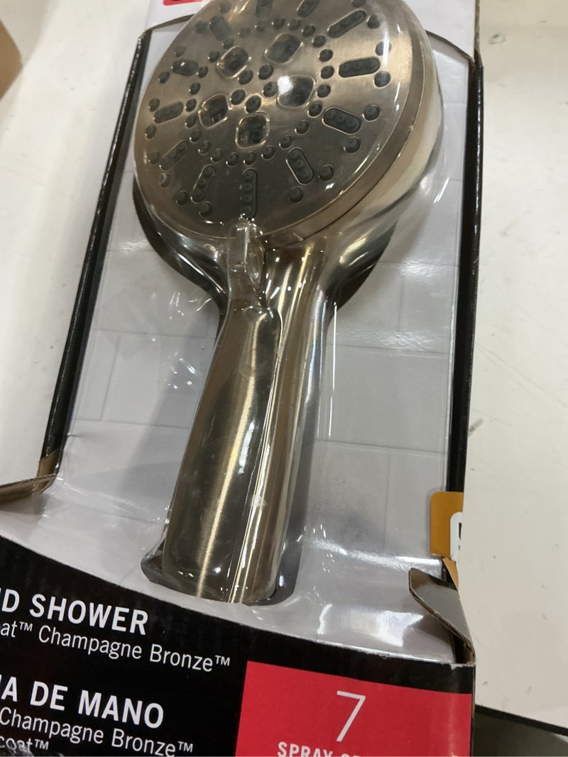Condition photo showing Good Condition for delta 7-setting brushed gold wall-mount handheld shower head with proclean spray, hand held shower head with high pressure spray, lumicoat chrampagne bronze 59584-cz-pr-pk lumicoat champagne bronze