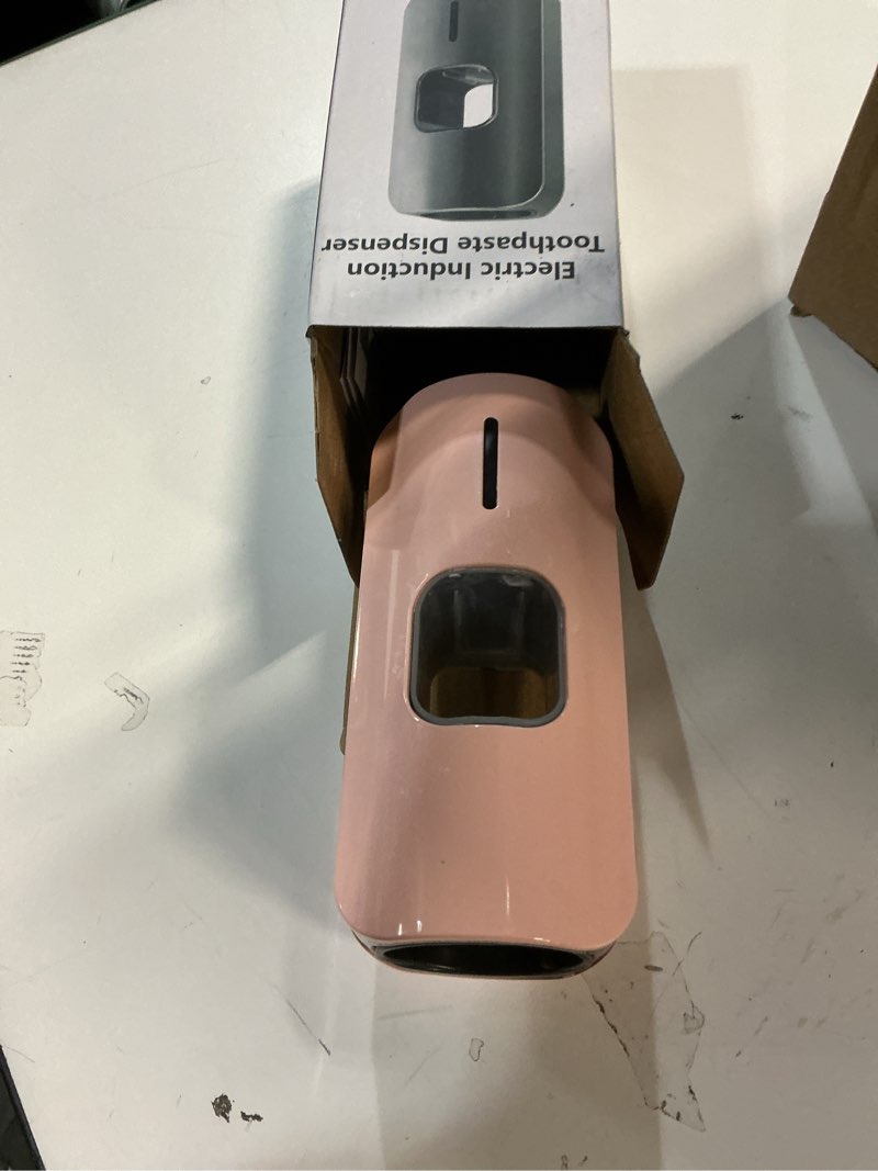 Condition photo showing As Is for Automatic Toothpaste Dispenser Wall Mounted - Smart Touchless Toothpaste Squeezer with 3 Adjustable Levels, 2 Toothbrush Holders- for Kids and Adults, Bathroom Essentials Pink-smart Toothpaste Dispensers