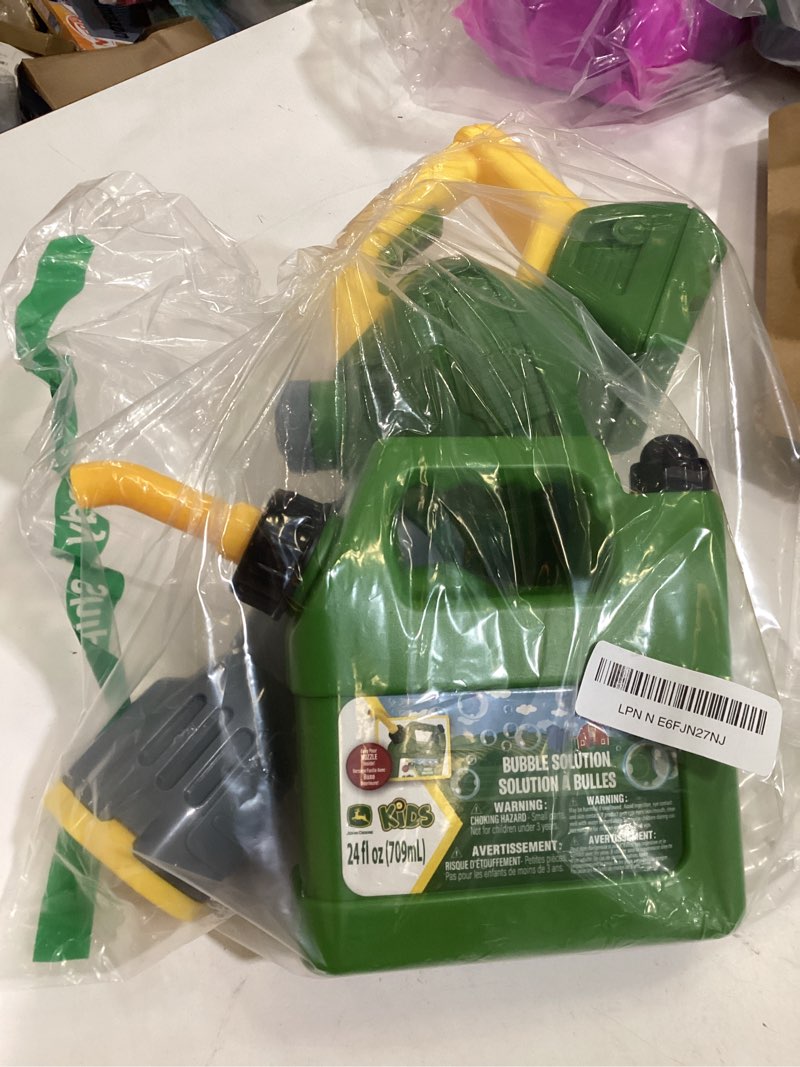 Condition photo showing As Is for john deere bubble leaf blower toy for kids includes 24oz bubble refill gas can, outdoor bubble machine for kids, easy to use, outdoor play, great gift toddler 3+