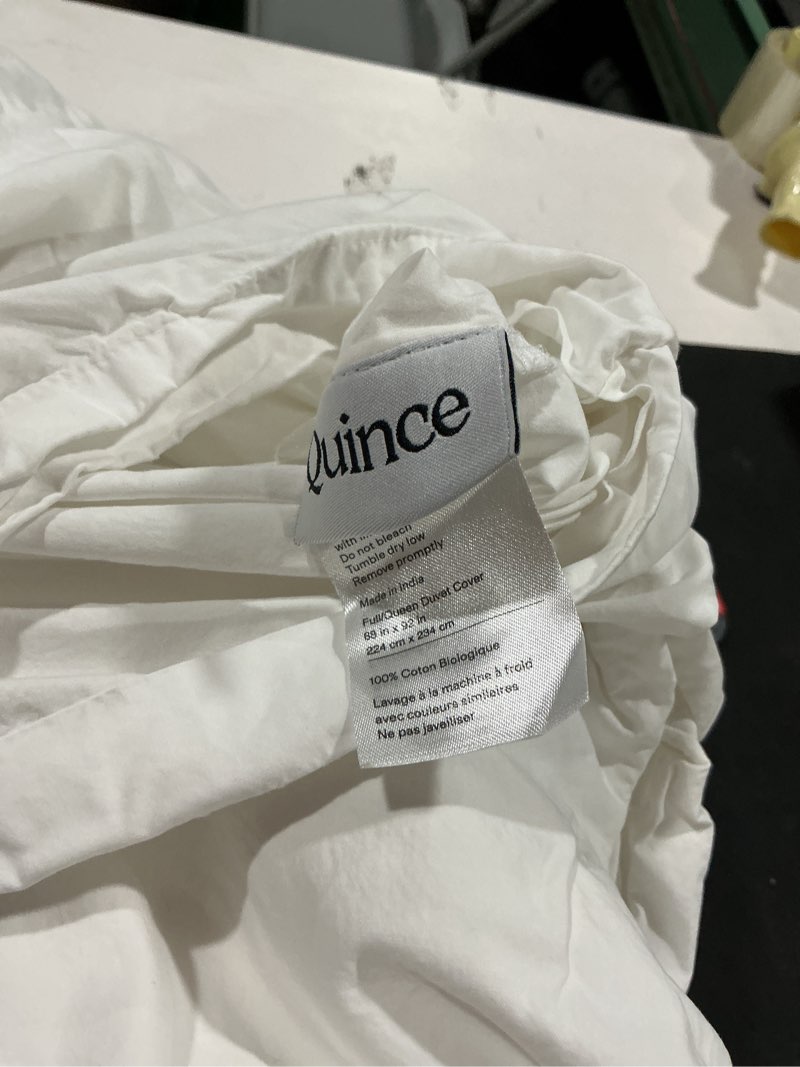 Condition photo showing As Is for full/queen quince crisp percale duvet cover