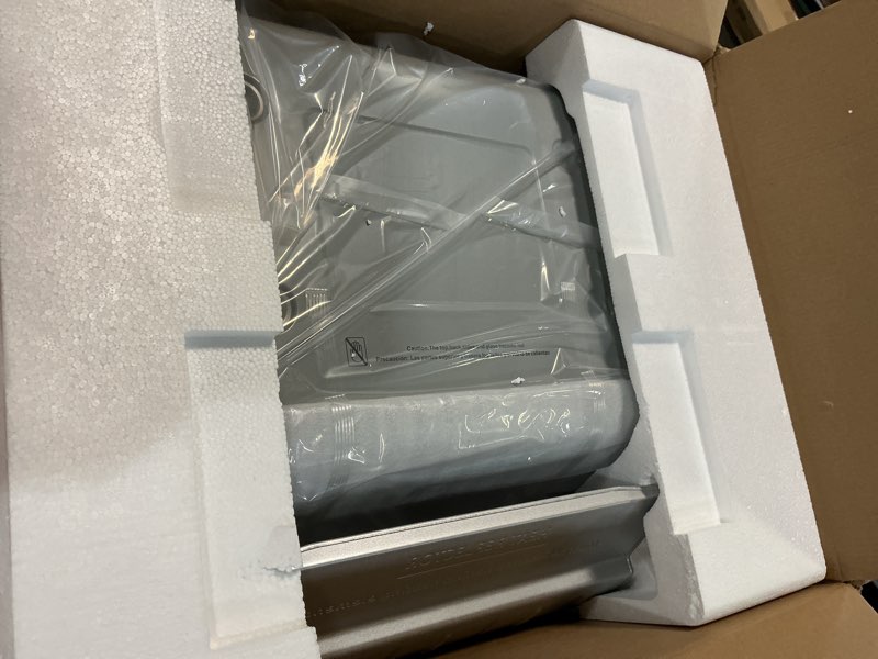 Condition photo showing New/Like New for ronco 6000 platinum series rotisserie oven, digital display, 12-pound capacity, auto shutoff, includes rotisserie spit, multi-purpose basket, 3 cooking functions: rotisserie, sear and no heat rotation new digital 6000 platinum series