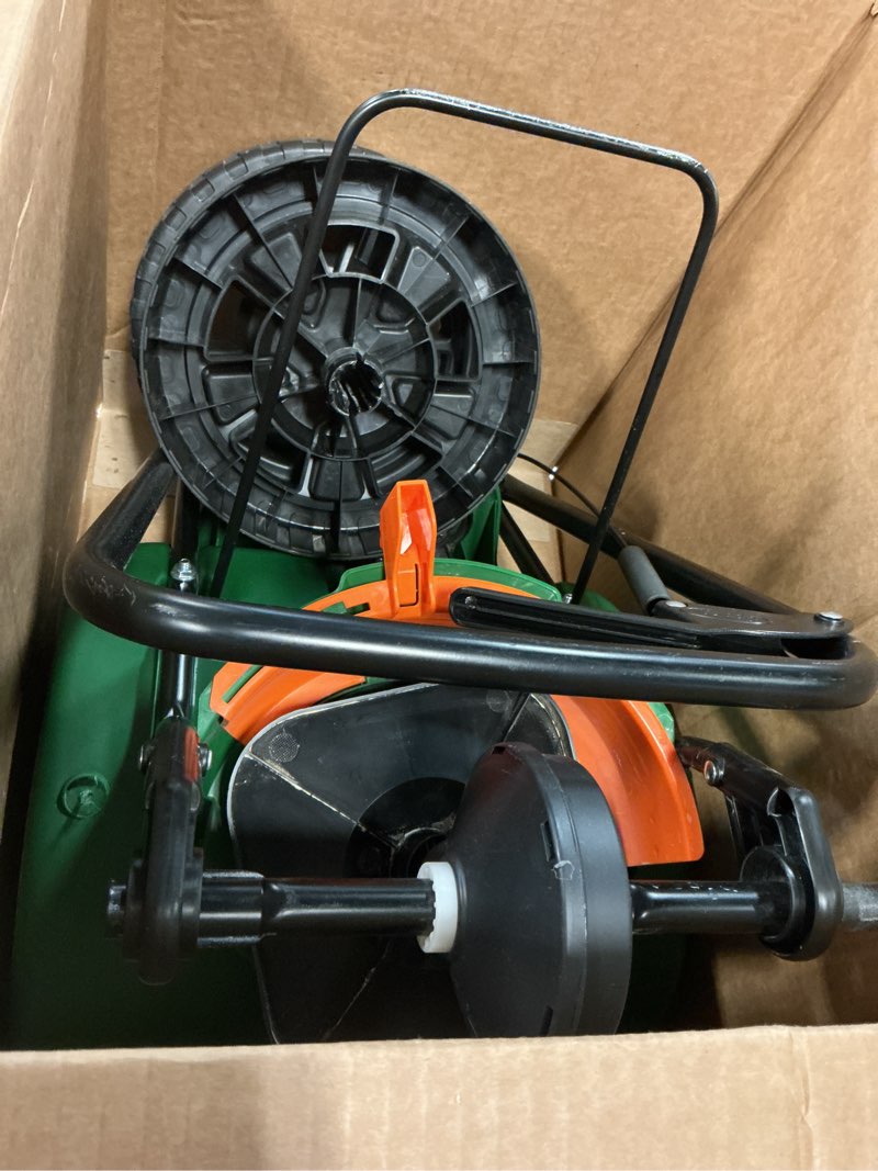 Condition photo showing As Is for scotts turf builder edgeguard mini broadcast spreader for seed, weed and feed, fertilizer, salt, ice melt, push spreader holds up to 5,000 sq.ft. product
