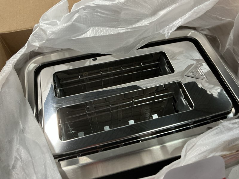 Condition photo showing Good Condition for gourmia 2 slice toaster – 6 browning levels with bagel and defrost mode, one-touch toasting, removable crumb tray, extra wide slots, compact design, black