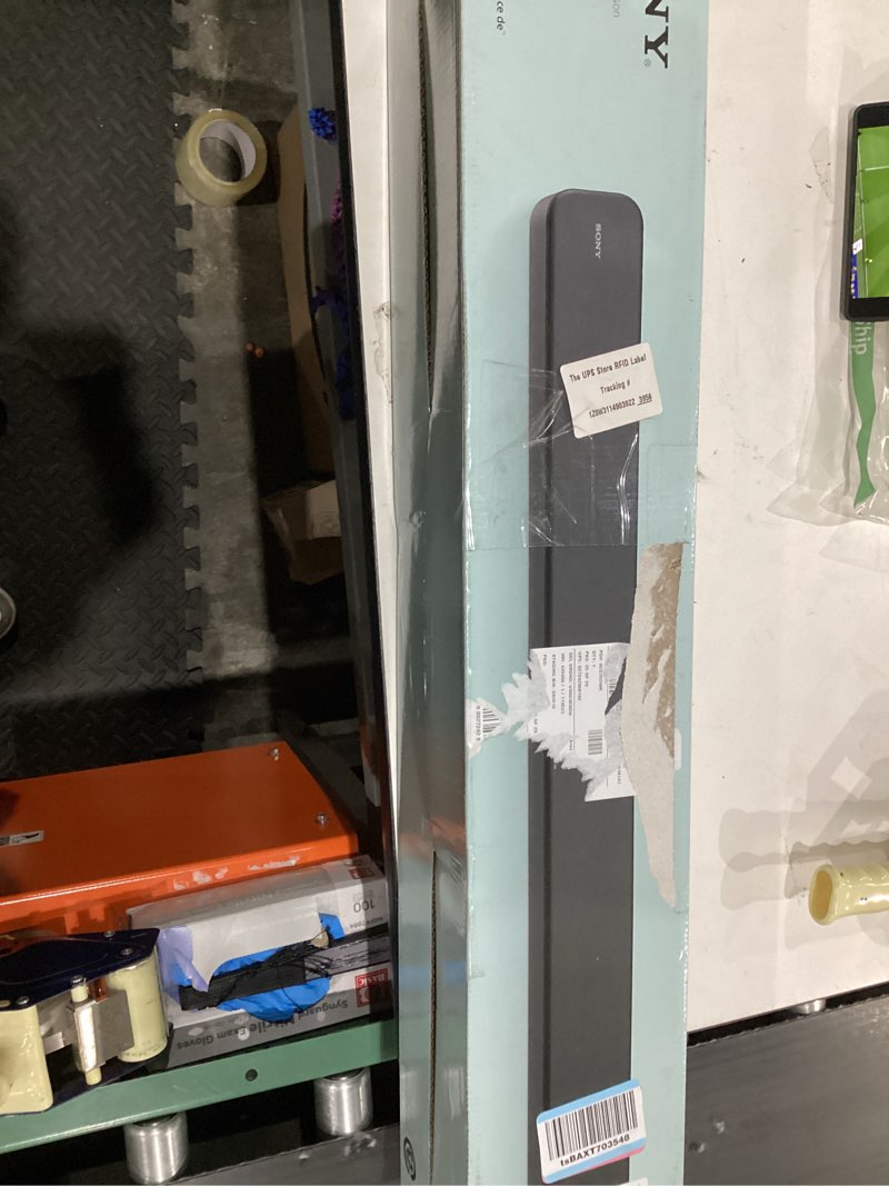 Condition photo showing New/Like New for Sony S100F 2.0ch Soundbar with Bass Reflex Speaker, Integrated Tweeter and Bluetooth, (HTS100F), easy setup, compact, home office use with clear sound black