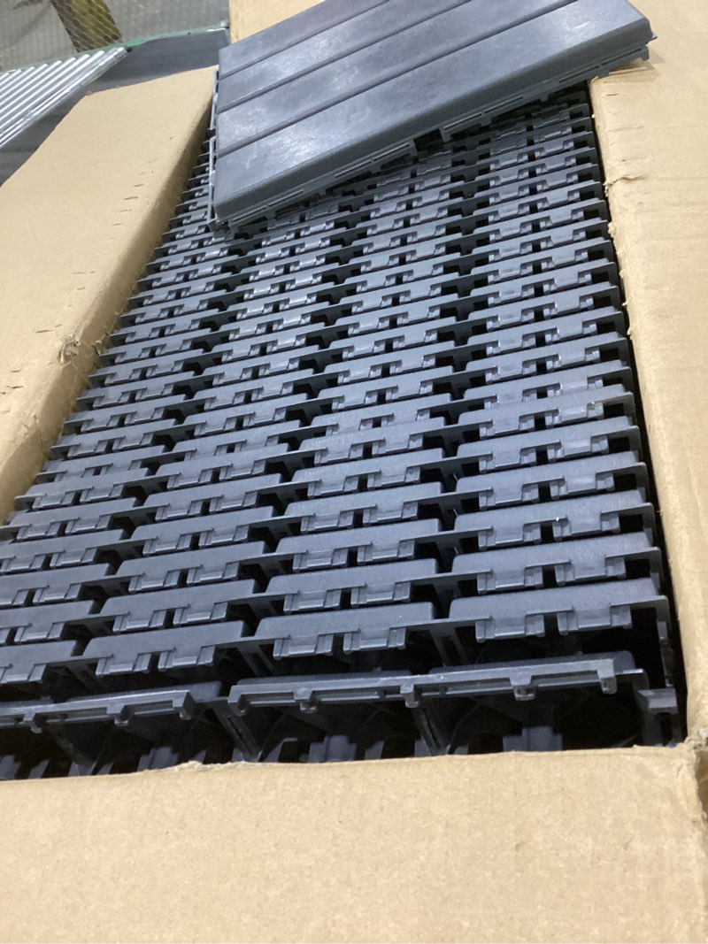 Condition photo showing Good Condition for 36 sq. ft plastic interlocking deck tiles, 36 pack,12"x12" waterproof outdoor flooring all weather use, patio floor decking tiles for porch poolside balcony backyard, dark grey 36 grey