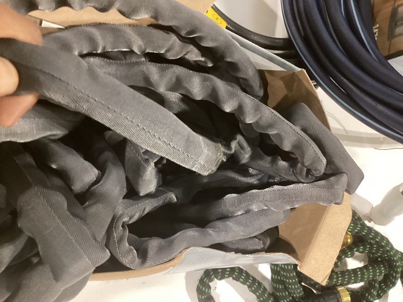 Condition photo showing As Is for zero-g teknor apex 5/8-in x 100-ft premium-duty kink free woven gray hose