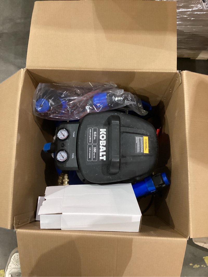 Condition photo showing As Is for  kobalt 6-gallon portable electric 150 psi pancake air compressor with accessories included