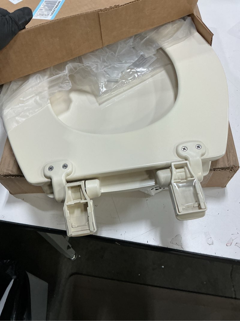 Condition photo showing As Is for Mayfair Cassel Slow Close Toilet Seat, Easy Clean, Non Slip Premium Wood Seat, Easy Install, Made in USA, Round, Bone Seat Round