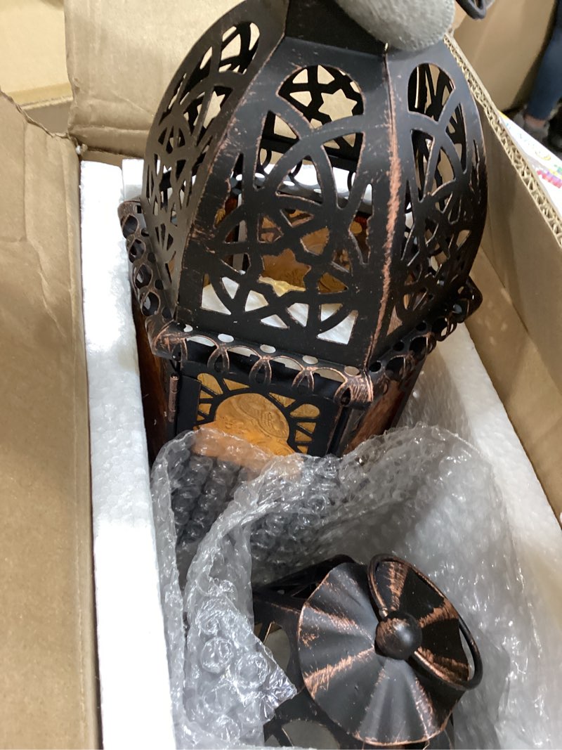 DECORKEY Vintage Moroccan-style metal lantern with amber glass panels