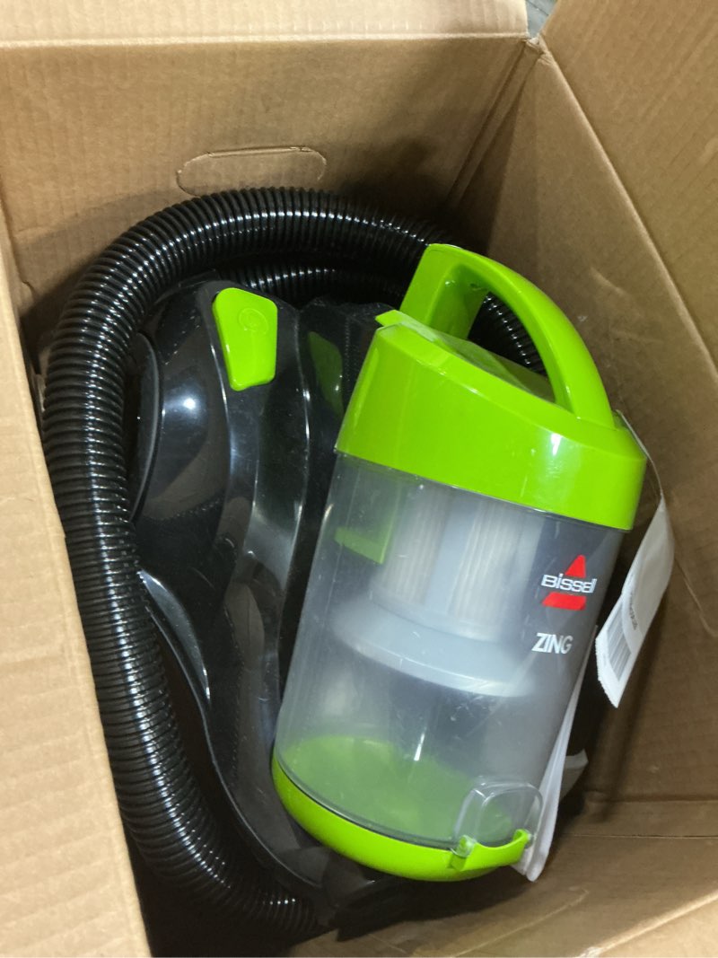Condition photo showing Good Condition for bissell 2156a zing canister bagless vacuum zing canister lime