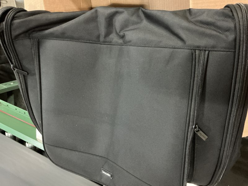 Condition photo showing Good Condition for Amazon Basics 43" Premium Garment Bag for Travel, Suit Bag with Shoulder Strap for Suits and Dresses, 1680D Polyester Fabric, Exterior/Interior Pockets, Leather-reinforced Corners, Trifold, Black