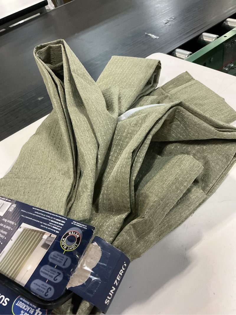 Condition photo showing As Is for sun zero vance 2-piece magnetic closure 100% blackout back tab curtain panel pair, 37"x84", sage green
